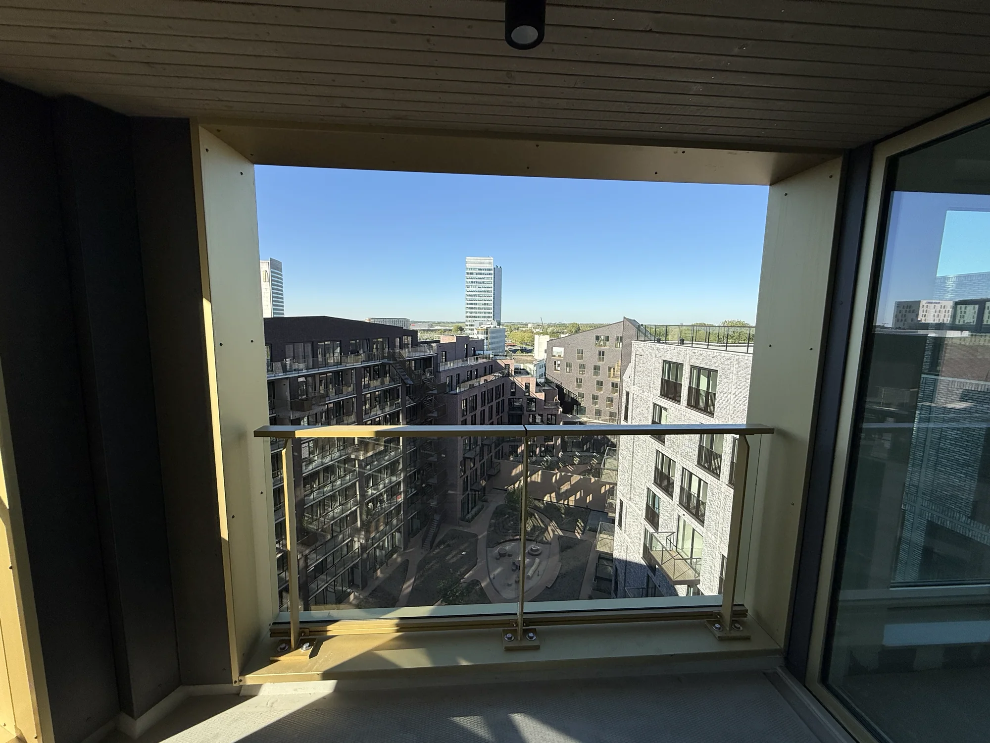 Covered west-facing balcony with city views